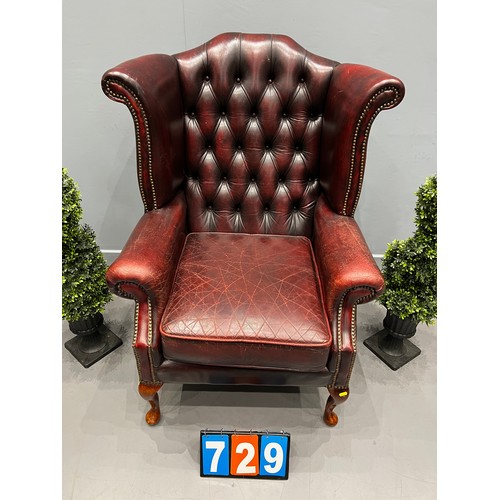 729 - Leather chesterfield wing back chair (better quality leather)