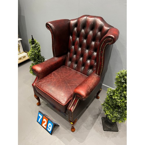 729 - Leather chesterfield wing back chair (better quality leather)