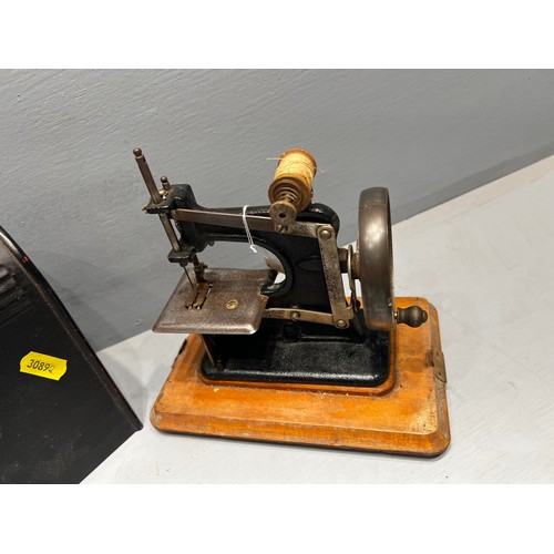 160 - Early miniature sewing machine