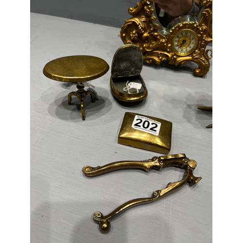 202 - Good brass ware inc dragon candle holder & clock mirror