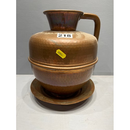 218 - Large copper jug + plate