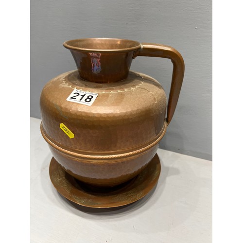 218 - Large copper jug + plate