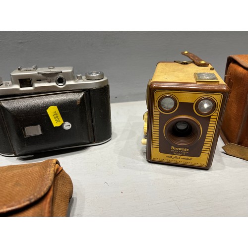 329 - 3 Vintage cameras