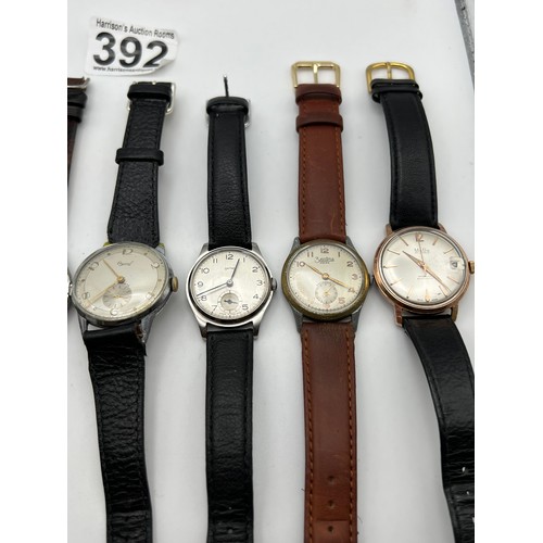 392 - 7 Leather strap gents watches