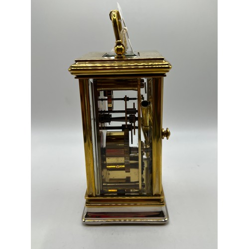 418 - Brass carriage clock & key superb quality with all bevelled glass working