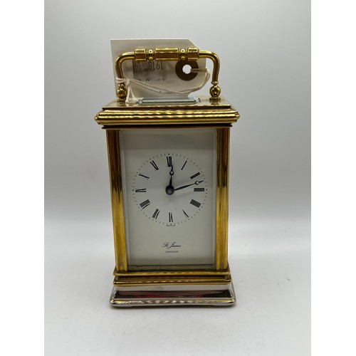 418 - Brass carriage clock & key superb quality with all bevelled glass working