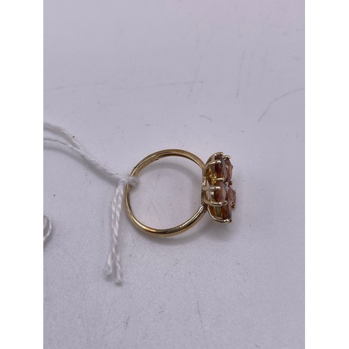 461 - 9ct Gold dress ring with amber coloured stones size L gross 2.6g