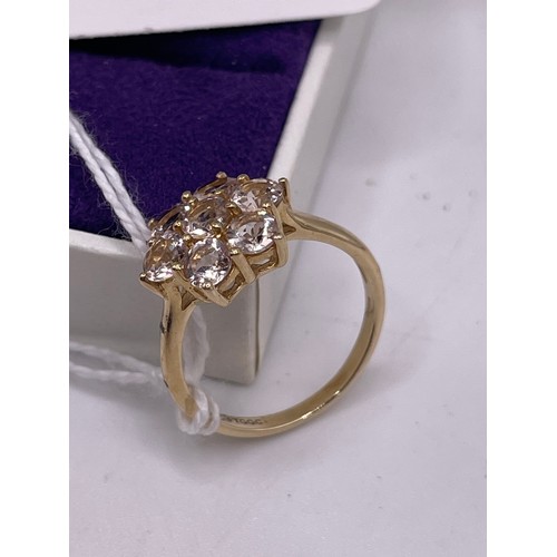 465e - 9ct Gold dress ring white stones gross 2.5g size o