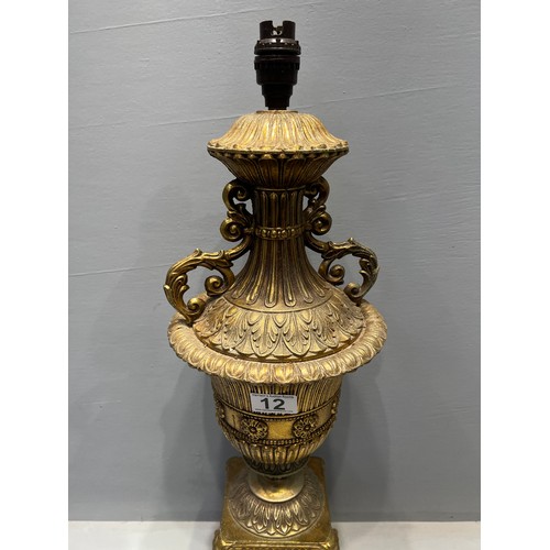 12 - Early 20th century quality brass table lamp of larger size heavily decorated