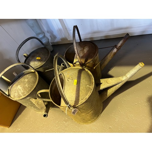 52 - 4 Galvanised watering cans