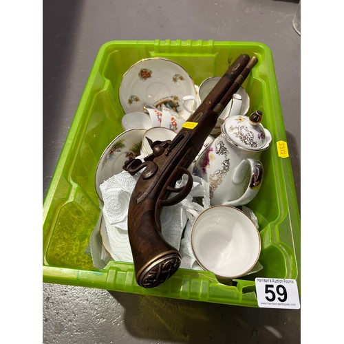 59 - China pottery + wall display gun