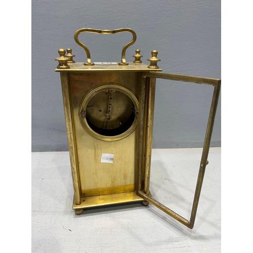 61 - Early 1900's brass clock (missing glass)