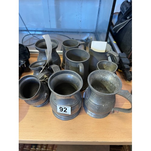 92 - Collection of early pewter tankards