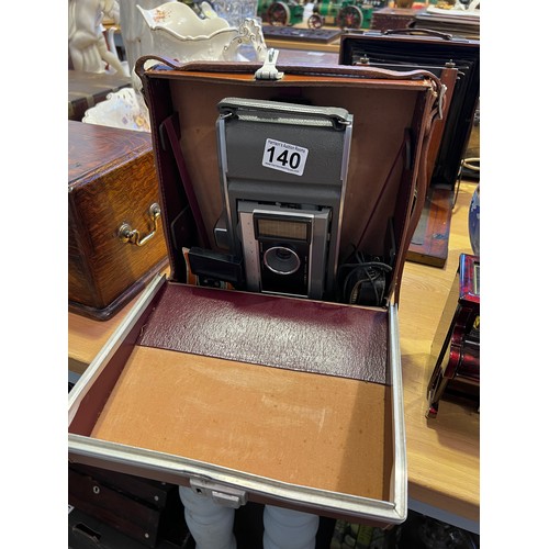 140 - Vintage polaroid camera in leather case