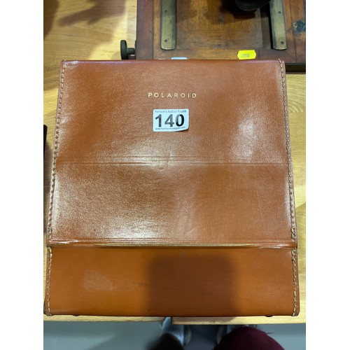 140 - Vintage polaroid camera in leather case