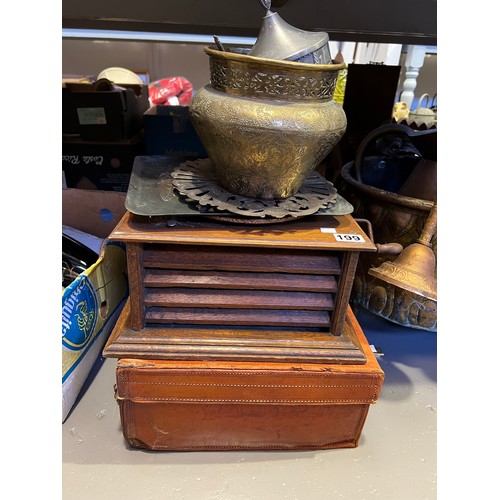 199 - Leather suitcase + wind up gram + brass ware