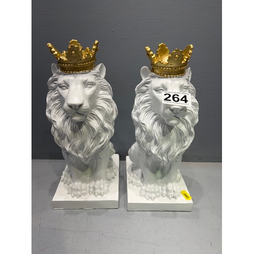 264 - Pair of crown top lion statues