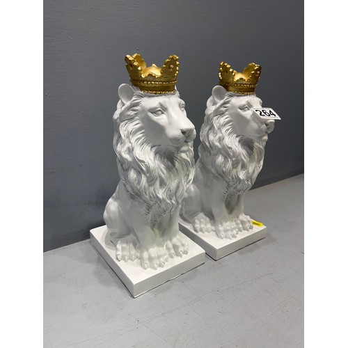 264 - Pair of crown top lion statues