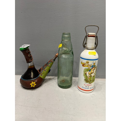 281 - Collectable glass bottle + alcohol