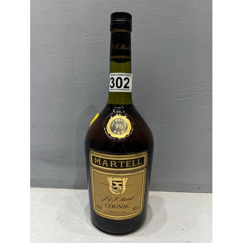 302 - Unopened bottle of martell cognac