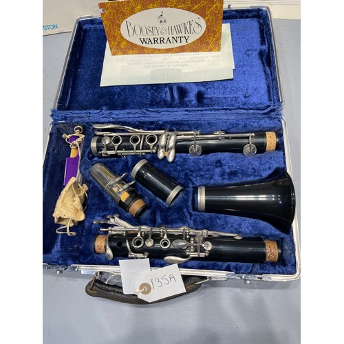 135a - Boosey & Hawkes cased clarinet with music