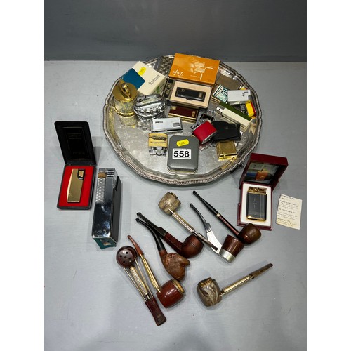 558 - Tray of collectable lighters & pipe (2 lighters are musical)