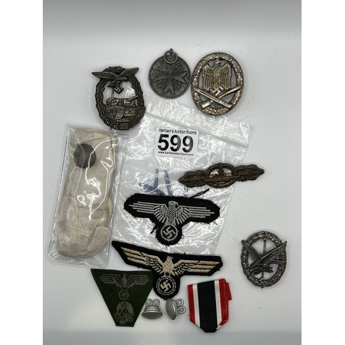 599 - Various WW2 style medals insignia buttons etc