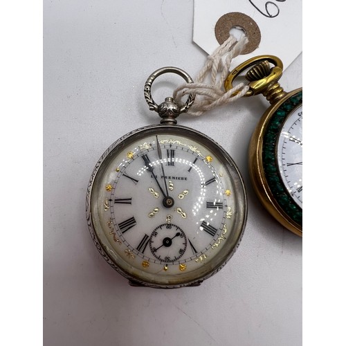 600b - 2 ornate pocket watches, one having ornate picture on the back, one is silver (both working)