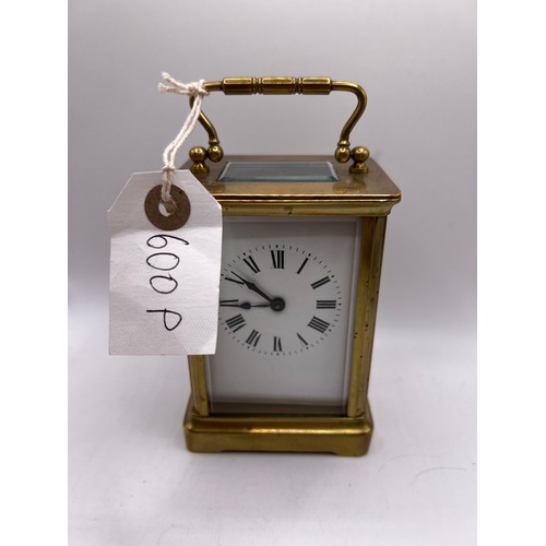 600p - brass carriage clock ticking away