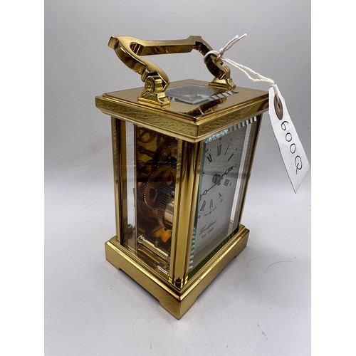 600q - brass carriage clock ticking away