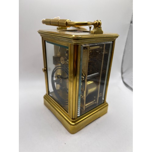 600s - brass carriage clock with striking bell ticking away