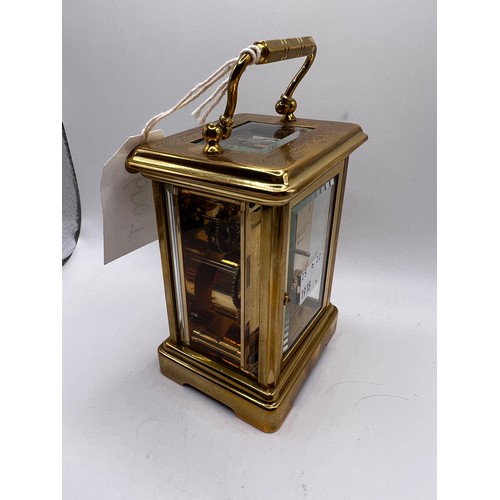 600t - brass carriage clock ticking away