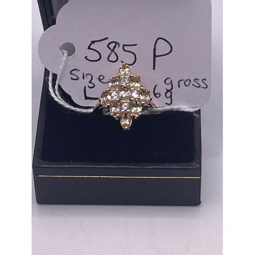 585p - 10ct Gold ring with white stones size L 2.6g gross