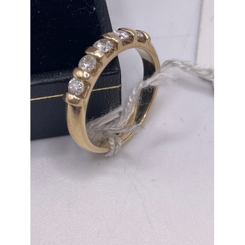 240 L - 9ct gold & Diamond Eternity ring 2.9g gross  Size K/L