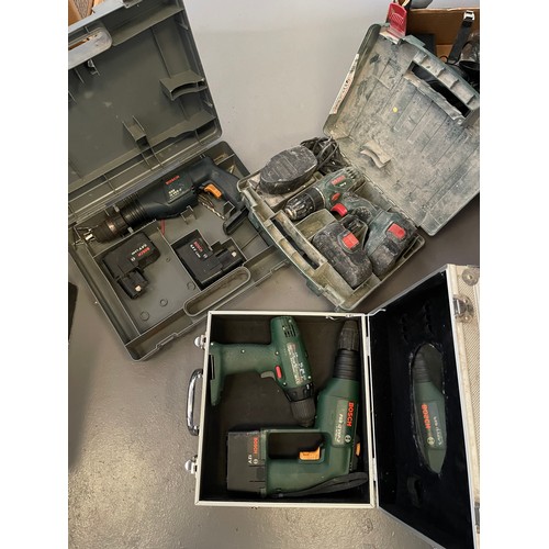 129 - Collection bosch drills in cases