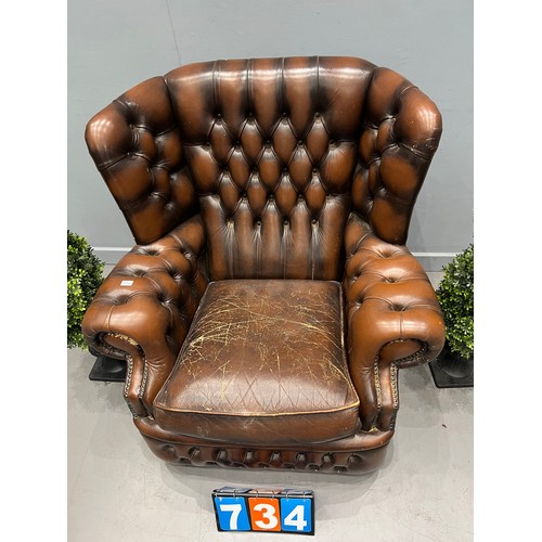 734 - Leather chesterfield wing back chair