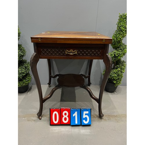 815 - Edwardian mahogany envelope table