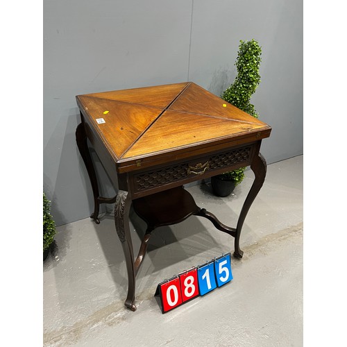 815 - Edwardian mahogany envelope table