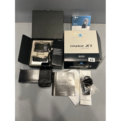 43 - Konica Minolta dimage x1 camera + Hugo boss case + 2 phones