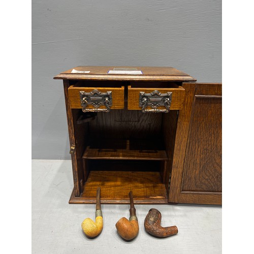 74 - Oak smokers cabinet dated 1938