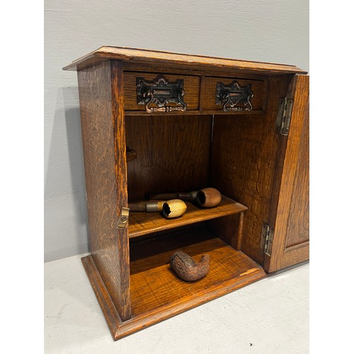 74 - Oak smokers cabinet dated 1938