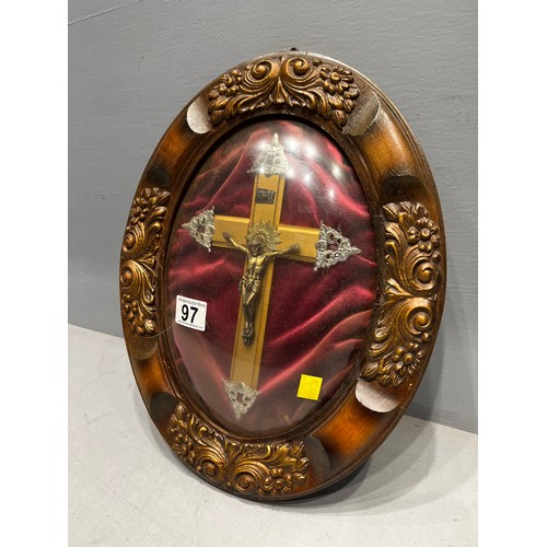 97 - Oval glass fronted plaque Jesus on cross