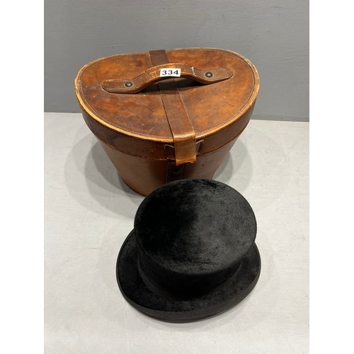 334 - Vintage quality top hat in leather case