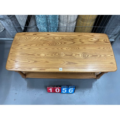 1056 - Ercol blonde pebble style coffee table