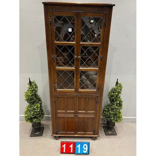 1119 - Oak leaded glass corner cabinet linen fold front