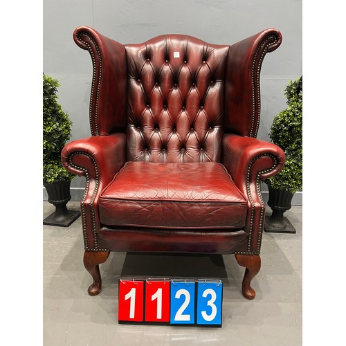 1123 - Leather chesterfield wing back chair