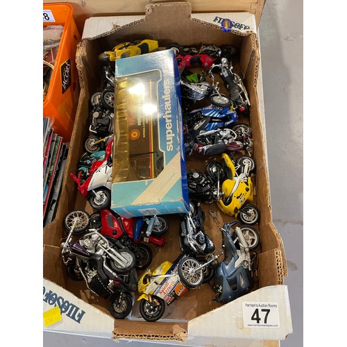 47 - Box toy bikes + toy 'target' lorry in original box