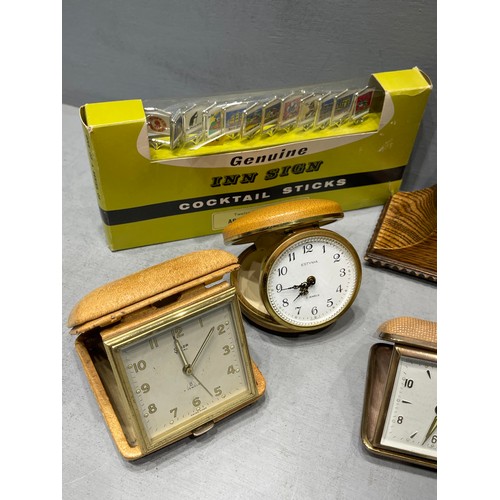 69 - Quantity clocks, oak mantle clock, travel clocks, + cocktail sticks