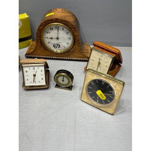 69 - Quantity clocks, oak mantle clock, travel clocks, + cocktail sticks