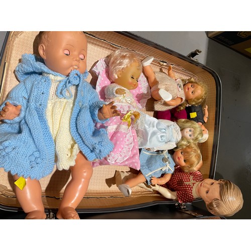 114 - Suitcase dolls